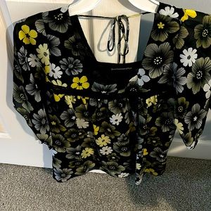 Black flowered print dress top